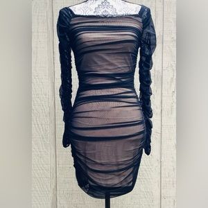 Bebe: black sheer mini dress